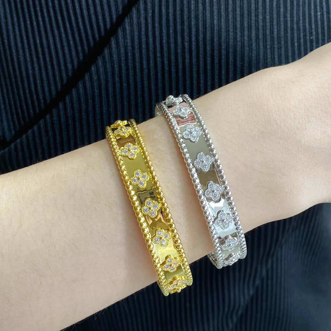 Van Cleef & Arpels Gold and Silver Flower Pattern Bracelets